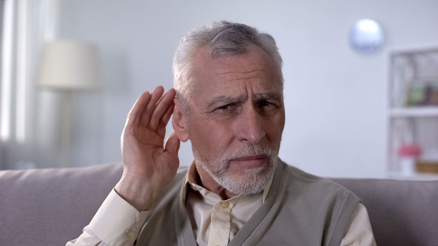 mans hearing aid not working and needs repairs